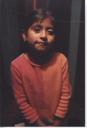 Young girl in a red shirt