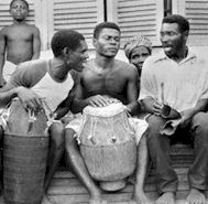 three men with percussion instruments